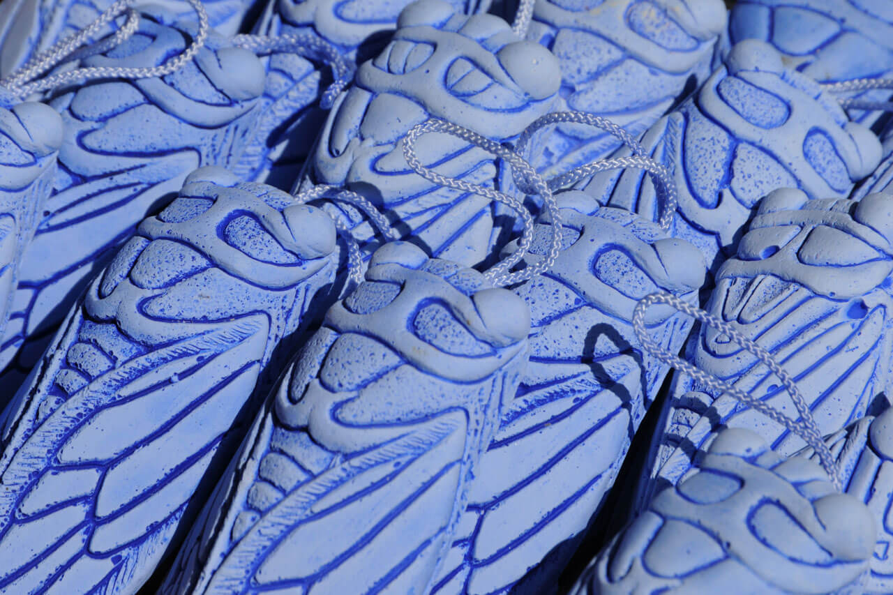 Blaue Seifen in Form von Zikaden Sprachkurs mit Kulturbezug