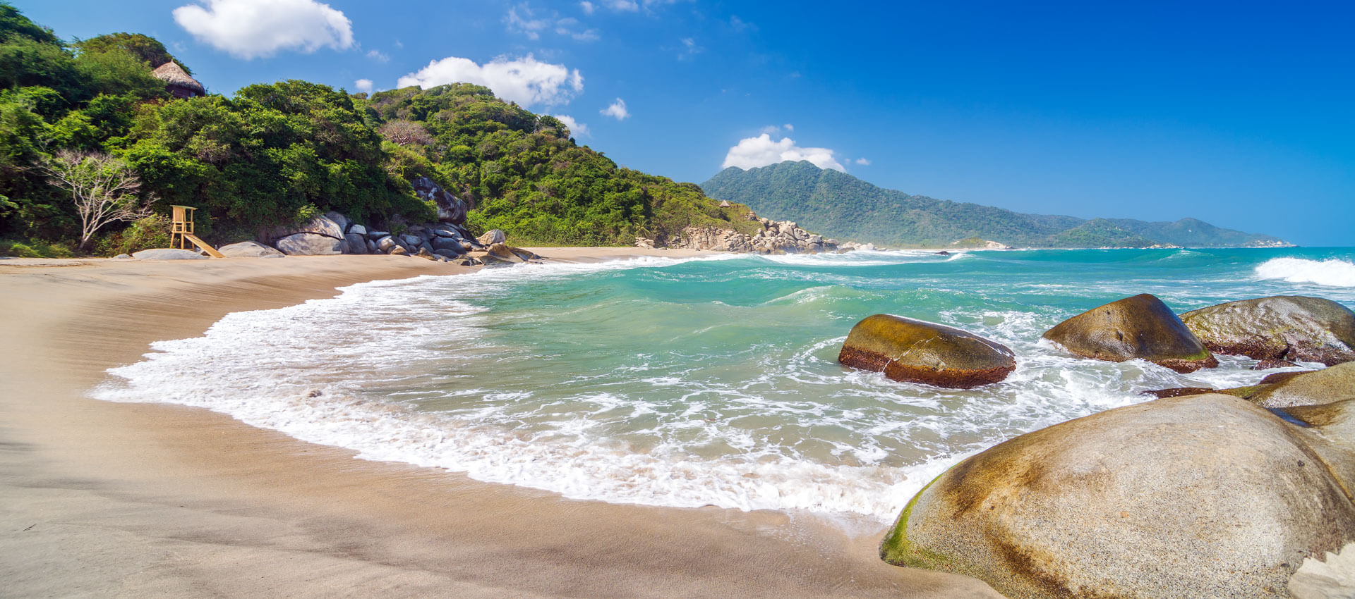 Strand im Tayrona Nationalpark Hörverstehen üben am Meer