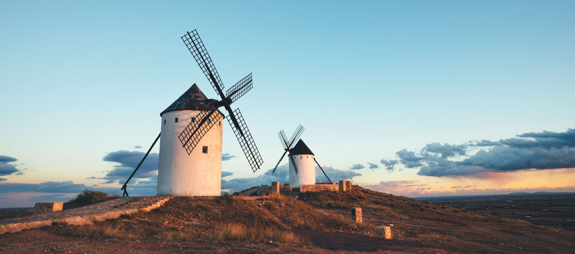 Windmühlen in La Mancha Abendlicht Lernstopp der Sprachreise, Aussprache verbessern mit Alltagsszenen.
